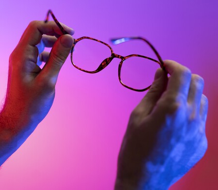 Hands Holding Glasses Gradient Background