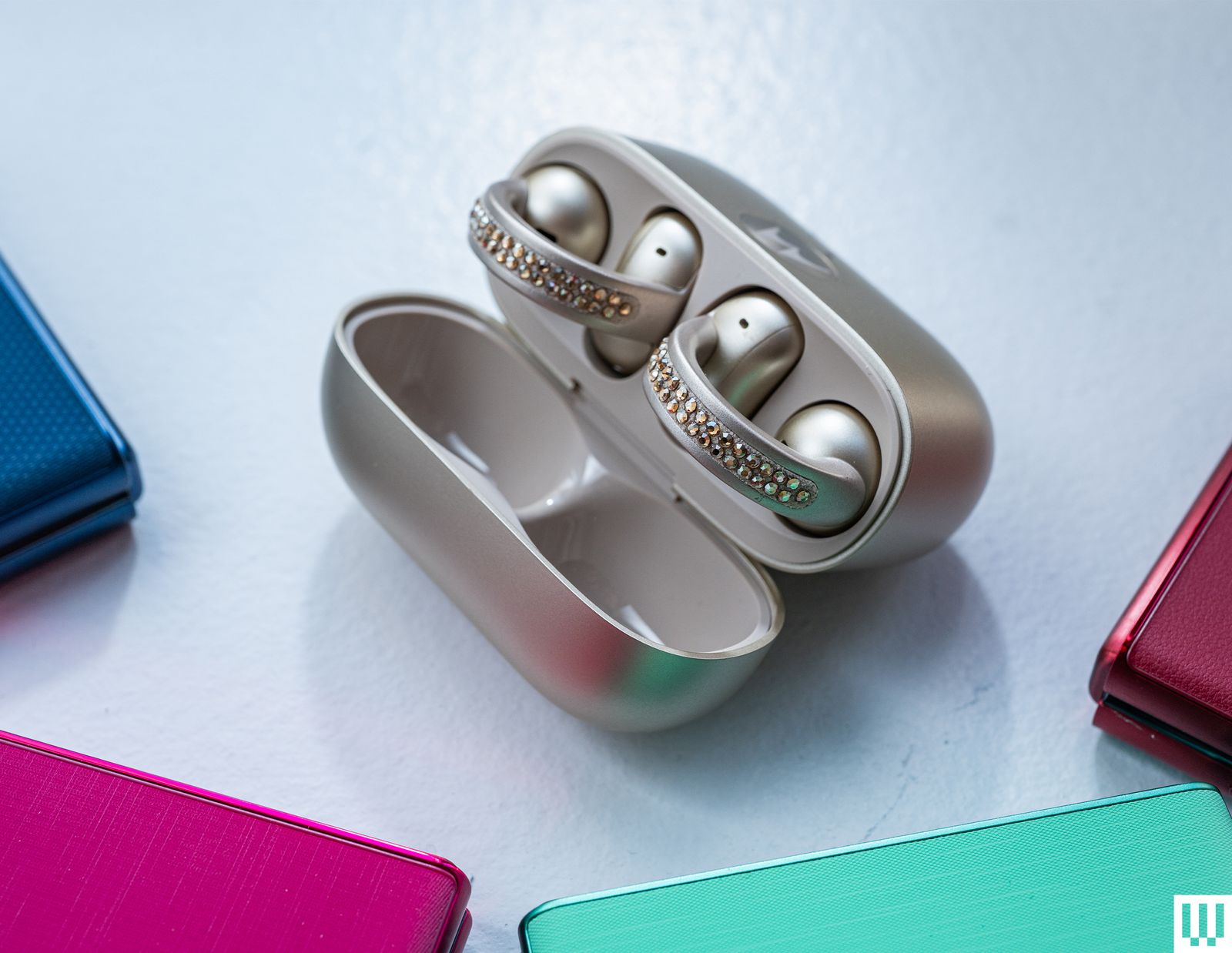 Image may contain Accessories Jewelry Electronics Phone Computer Hardware Hardware Mouse and Ring