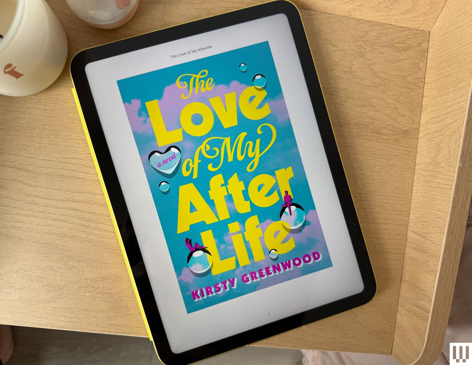 Image may contain Computer Electronics Tablet Computer Cup Person and Surface Computer